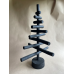 Handmade fire-burnt wood in black Xmas tree