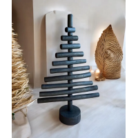 Handmade fire-burnt wood in black Xmas tree